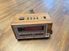 Vintage General Electric Faux Wood Grain Alarm Clock Am/fm Radio 74601A Works. Fixed Price $22.99.