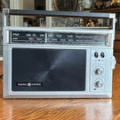 General Electric 7-2850H Am/fm Portable Radio Silver Black Ac/dc Tone Control. Fixed Price $18.26.