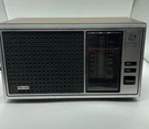 Vintage General Electric Am/fm Radio Model No. 7-4115A Wood Grain Working Flaw. Fixed Price $39.99.