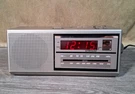 Vintage Two Wake Times Am Fm Alarm Clock Radio Model 7-4637A Silver/woodgrain. Fixed Price $24.99.