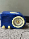 Vintage Repro Blue Fada Bullet Battery Opt Am/fm Radio Clock Transistor Works!. Fixed Price $99.00.