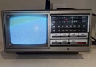Vintage 7-7150B Portable Black And White Crt Tv Am/fm Radio Tested Working. Fixed Price $55.00.