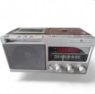 General Electric Wood Grain Cassette Alarm Clock 7-4905A. Fixed Price $30.00.