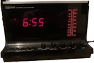 Montgomery Ward's Airline Am/fm Digital Alarm Clock Radio Woodgrain Black Red. Fixed Price $29.99.