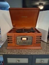 Crosley CR78 Retro Wood Turntable, Cd, Cassette Am/fm Radio Works. Fixed Price $25.00.