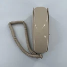 Vintage Western Electric Trimline Beige Corded Touch Tone Wall Telephone. Fixed Price $149.99.