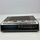 Vtg General Electric 7-4646A Amfm Digital Clock Radio Blue Display Wood Grain. Fixed Price $28.45.
