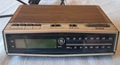 Vintage Digital Am/fm Clock Radio Wood Grain Model No. 7-4612B Works. Fixed Price $29.99.
