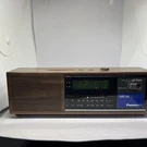 Vintage Simulated Wood Grain Panasonic RC-6075 Fm-am Digital Alarm Clock Radio. Fixed Price $49.94.