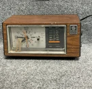Vintage General Electric 7-4550C Am/fm Alarm Clock Radio Wood Grain. Fixed Price $35.00.