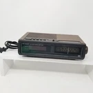 Sharp FX-100C Electronic Digital Alarm Clock Radio Turns Speaker Blown. Fixed Price $10.00.