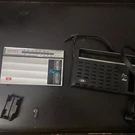 Sharp FX-163 Radio Broken Battery Pack Has Case. Fixed Price $74.99.