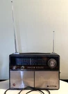 Cadaux Solid State Radio Vintage Tested/working Double Antenna. Fixed Price $45.00.