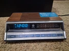 Vintage General Electric 7-4662B Am/fm Alarm Clock Radio Wood Grain Works. Fixed Price $39.95.