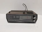 General Electric Clock Radio Vintage C4331B Flip Am Fm Walnut Grain Ac. Fixed Price $64.99.