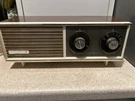 Vintage Plastic Zenith Solid State Radio Receiver Wood Grain Works B214W. Fixed Price $45.99.