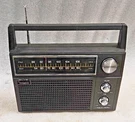 Radioshack Realistic Am/fm Portable Transistor Cat No. 12-668. Fixed Price $53.23.