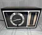 General Electric 7-4501B Vintage Clock Walnut Analog Works/radio Does Not. Fixed Price $19.99.