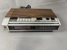 General Electric Fm Am Digital Clock Radio Wood Grain Vintage 7-4634 Silver. Fixed Price $17.99.