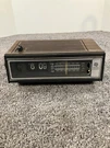 Vintage General Electric Flip Alarm Clock Radio Am/fm Model: 7-4410C. Fixed Price $104.99.