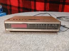 Vintage Magnavox AS128 Electronic Clock Radio Featuring Faux Wood Grain Finish. Fixed Price $17.95.