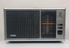 General Electric Am Fm Radio-model No 7-4115B Wood Grain Vintage. Fixed Price $32.99.
