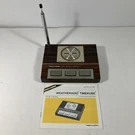 Vintage Realistic Weatheradio Timekube Receiver Model No. 12-148. Fixed Price $24.99.