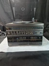 Montgomery Ward Turn Table Record Vinyl And Dual Cassette Tape Deck JSA63157. Fixed Price $65.00.