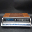 Vintage General Electric 7-4662A Electronic Touch Am/fm Alarm Clock Radio. Fixed Price $56.99.