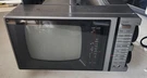Vintage Black And White Television With Am/fm Radio.. Fixed Price $35.00.