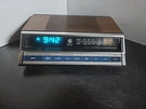 Vintage General Electric 7-4662B Am/fm Alarm Clock Radio Wood Grain Works. Fixed Price $30.00.