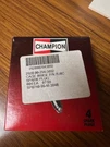 Spark Plugs, Champion Brand, Part Number RJ8C. Deal. Fixed Price $14.98.