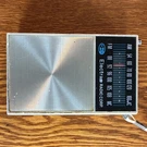 Electra Radio Corp. Solid State Am/fm Portable White With Wrist Strap. Fixed Price $16.99.