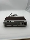 Vintage Magnavox 479 Radio Alarm Clock Wood Grain. Fixed Price $18.00.