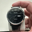Bulova American Clipper Automatic Black Dial Date Day Indicator Watch 96C131. Fixed Price $175.00.
