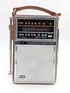Vintage General Electric Am/fm Portable Radio Model P977B Leather Not Working. Fixed Price $18.00.