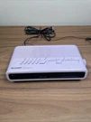 Sharp FX-C1 Purple Digital Clock Radio Am/fm. Fixed Price $49.99.
