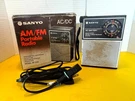 Vintage Sanyo RP-5115U Portable Radio Black Am/fm 2-BAND Solid State With Cable. Fixed Price $15.00.