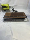 Vintage Clock Radio Am/fm Dual Alarms Woodgrain Cabinet 7-4636D. Fixed Price $25.00.