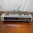 General Electric 7-4639A Vintage Digital Am/fm Clock Radio Woodgrain Silver. Fixed Price $25.49.