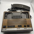 Vintage General Electric Am/fm Radio Alarm Clock W/telephone Model 7-4712A. Fixed Price $29.95.