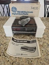 New Opened Box General Electric Wood Grain Am/fm Radio Alarm Clock 7-4635B. Fixed Price $44.95.