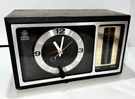 Vintage General Electric Clock Model 7-4501 Walnut Grain (no Fm-radio). Fixed Price $24.95.