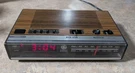 General Electric Wood Grain Digital Radio Alarm Clock Model 7-4624B. Fixed Price $25.90.