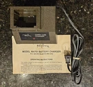 New Regency Land Mobile Carry Com Battery Charger Model MA-701. Fixed Price $18.00.