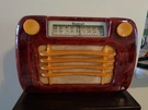 Sentinel Catalin 284 Wavy Grill Radio Marbled Red Color.. Fixed Price $1395.00.