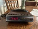 Vintage Am/fm Electronic Clock Radio W/phone. Fixed Price $15.00.