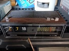 Vintage Sound Design Model 3480 Flip Clock Radio Wood Grain Tested Rough Shape. Fixed Price $19.00.
