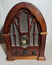 General Electric Reproduction Model No 7-4100JA Cathedral Am/fm Radio Wood. Fixed Price $55.25.