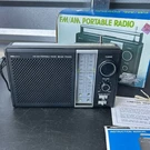 New Vintage Kmart Fm Am Portable Radio 2-WAY Power Model 06-31-51 Black With Box. Fixed Price $79.99.